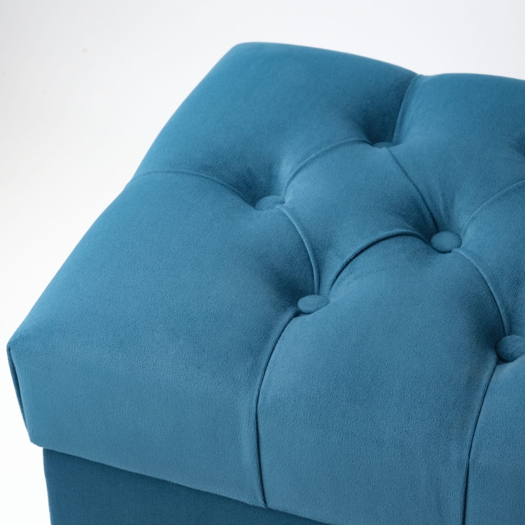 Turquoise gewatteerde poef met opbergruimte, comfortabel en functioneel voor de woonkamer