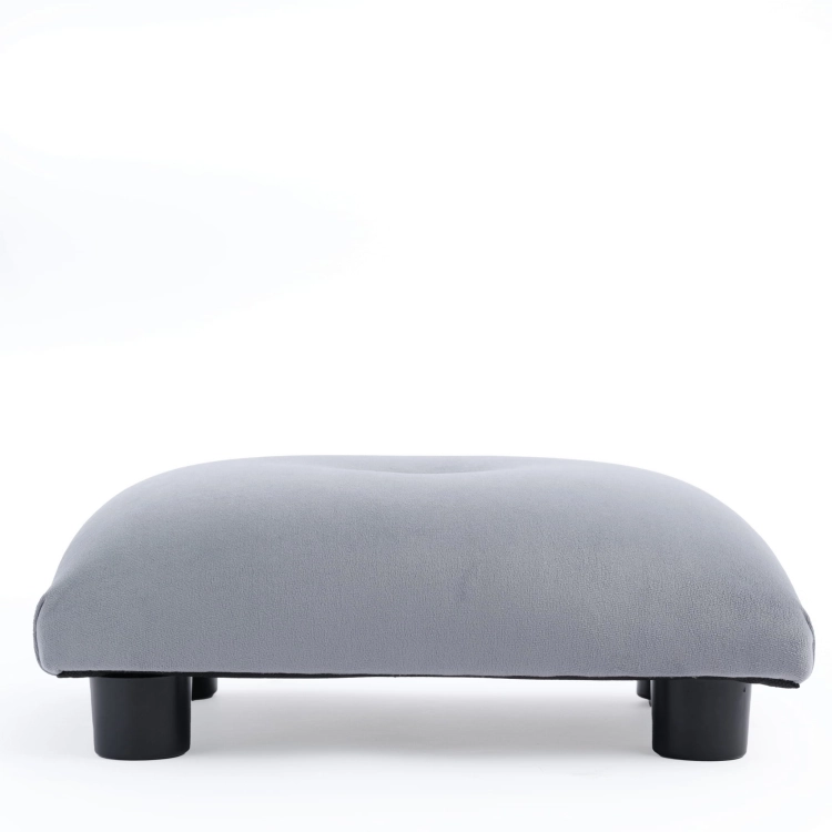 Gewatteerde poef in grijs, een comfortabel en decoratief meubelstuk