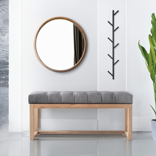 Bank met gewatteerde zitting in grijs en houten structuur