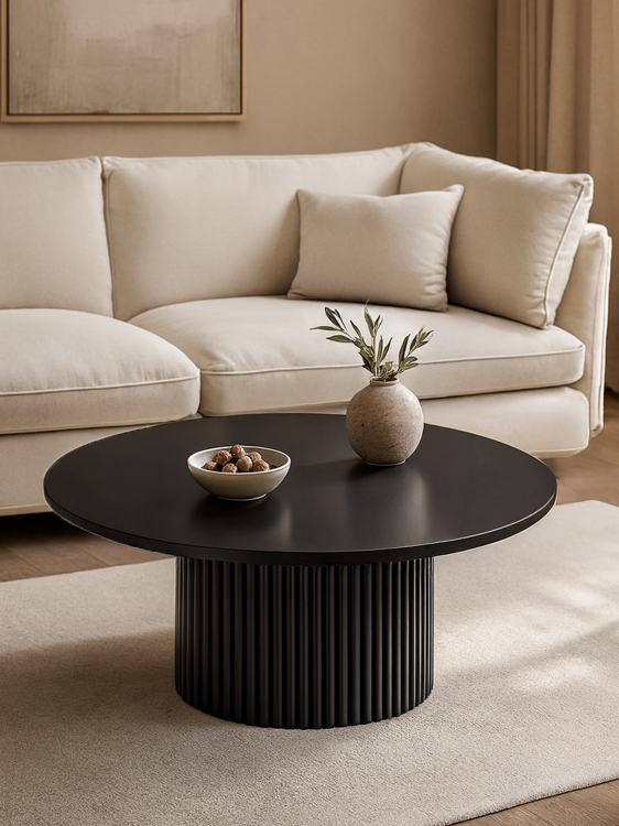 czarny stolik kawowy z ryflowaną nogą