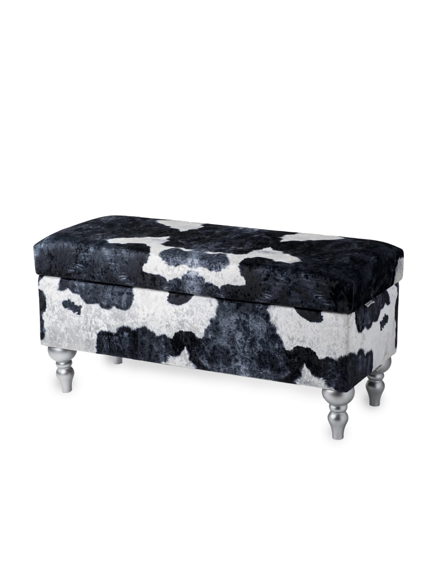 Opbergpoef met bekleding in koeienmotief, comfortabel en decoratief voor het interieur