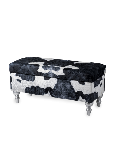 Opbergpoef met bekleding in koeienmotief, comfortabel en decoratief voor het interieur