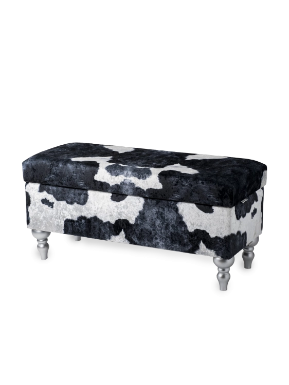 Opbergpoef met bekleding in koeienmotief, comfortabel en decoratief voor het interieur